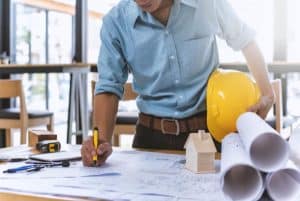 A General Contractor with Construction Plans