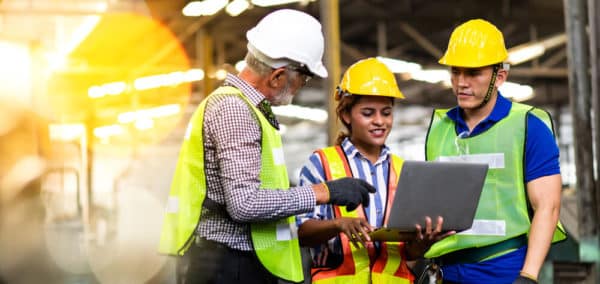 Construction Workers with a Laptop