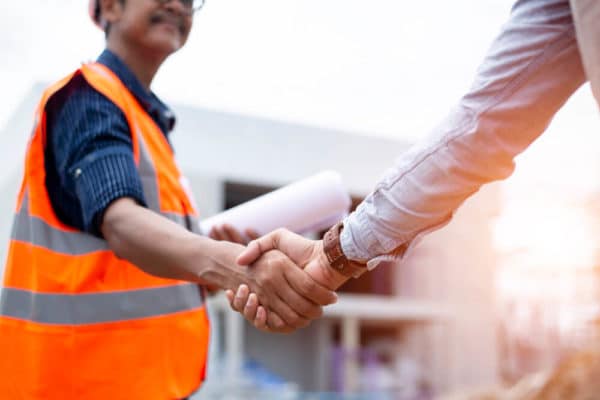 Handshaking Men