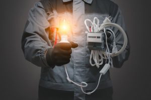 man holding light bulb