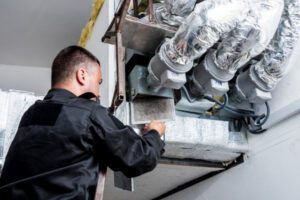 HVAC technician working.