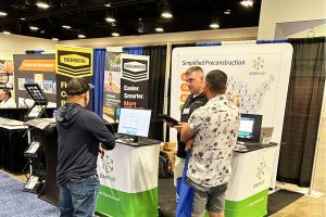 workers of talking to customers at the fair