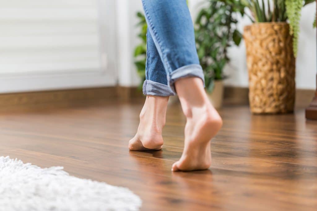 Woman walking on Parquet