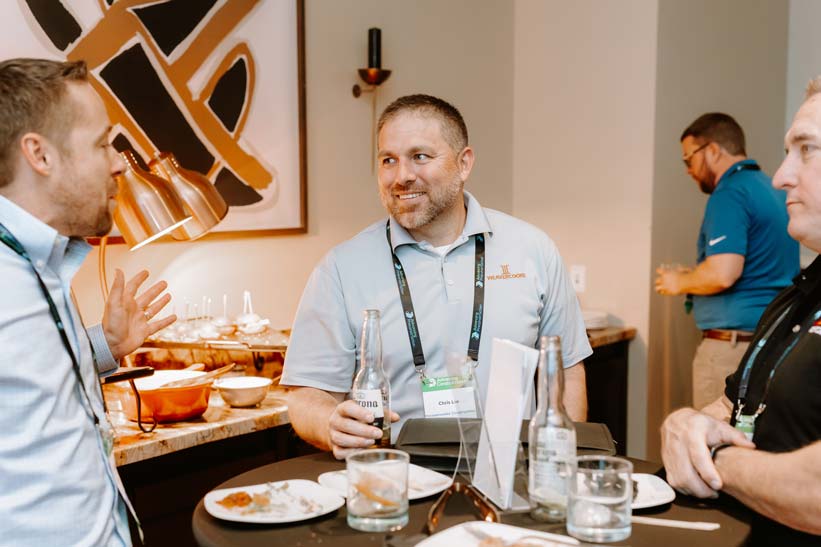 people chatting at an event