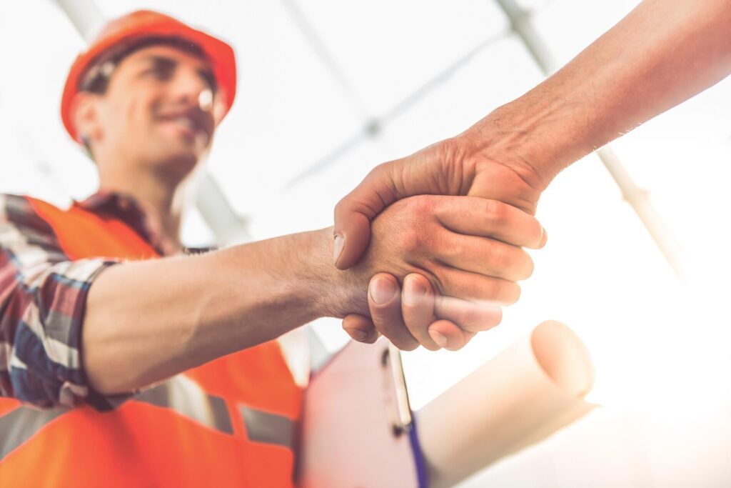 Handshaking Men