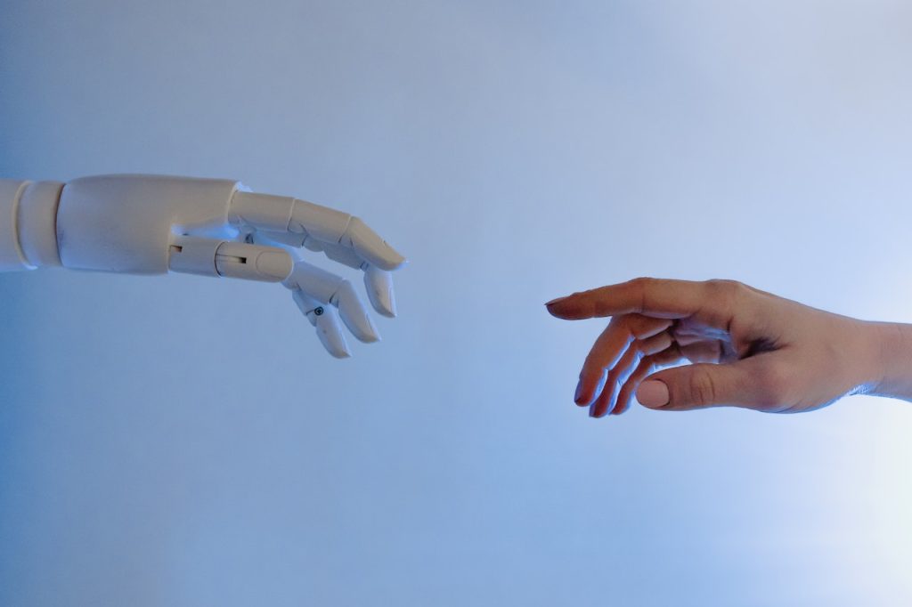 robot and human hand