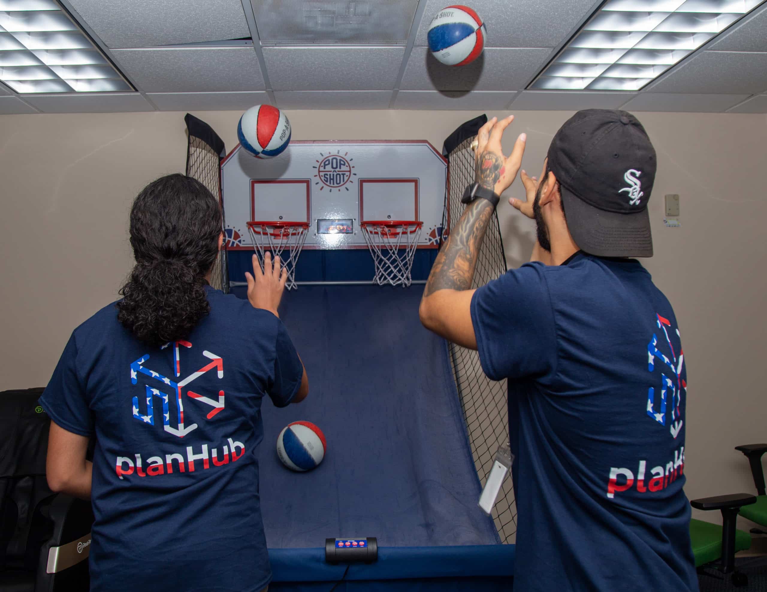 PlanHub Workers Playing Basketball