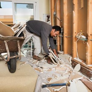 Worker cleaning up.