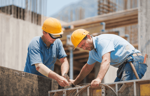 2 Construction Workers Working